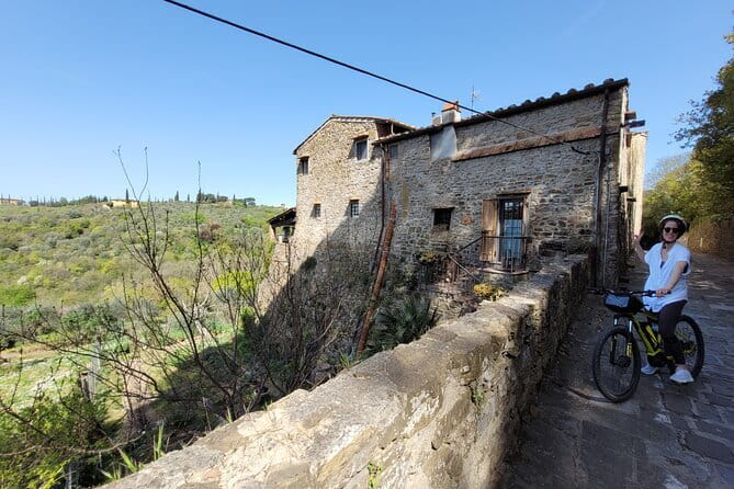 2-Day E-Bike Tuscany Tour with Meals, Wineries, and Farmstay - San Casciano, vineyards, and the Borgo Machiavelli stop