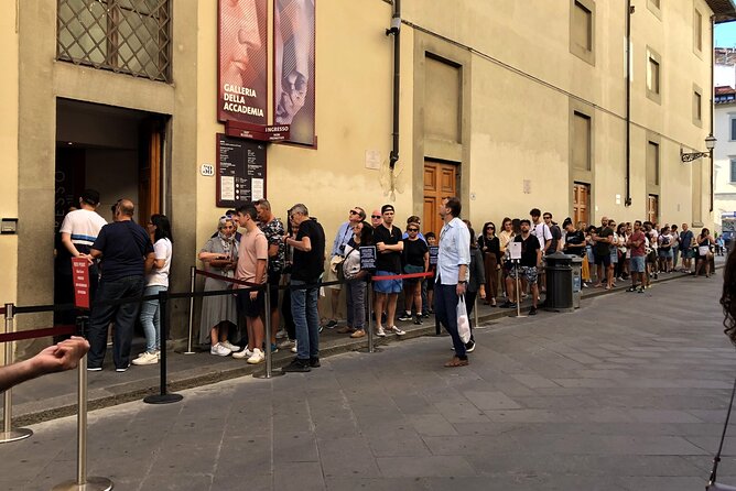 Accademia Gallery Priority Entry Ticket with eBook - Collecting Your Ticket on Via Ricasoli