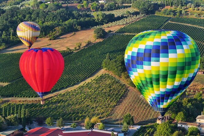 Experience the Magic of Tuscany from a Hot Air Balloon - Floating over vineyards, castles, and hill towns