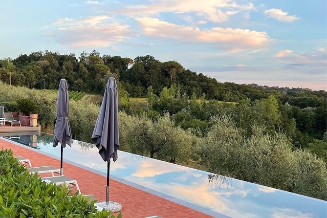 Farm To table Experience on an organic hilltop estate in Tuscany - The pool and the little church walk