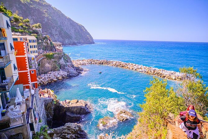 Florence: Cinque Terre Park Day Trip with Optional Street Food - Manarola gives you the first big view