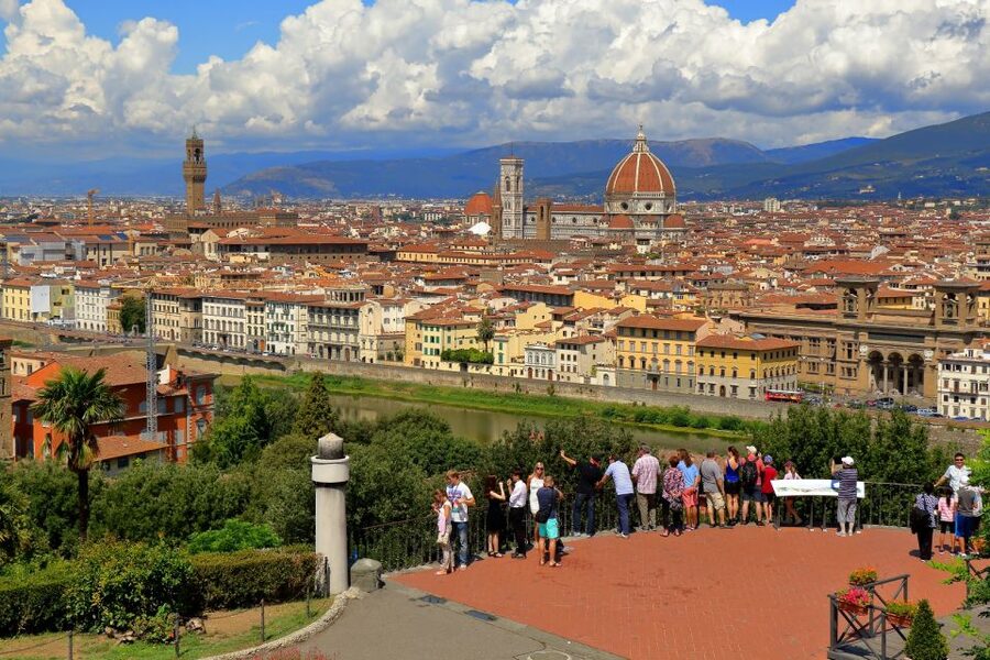 Florence: City Sightseeing Guided Bike Tour - Crossing the Arno toward Oltrarno