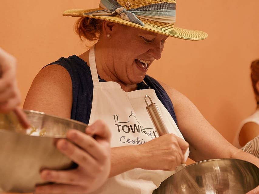 Florence: Cooking Class with Local Food Market Tour - Rolling pasta and building a Tuscan meal