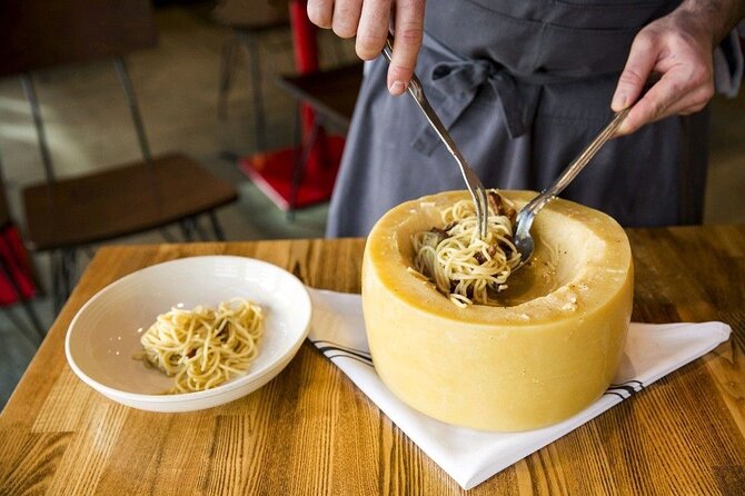 Florence: Flambé Cheese Wheel Truffle Pasta Class & Tiramisù - The cheese wheel and truffle pasta finale