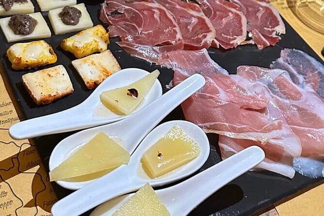 Florence Food Tour with Truffle Pasta, Steak & Free Flowing Wine - The first table: prosciutto, cheese, and aged balsamic