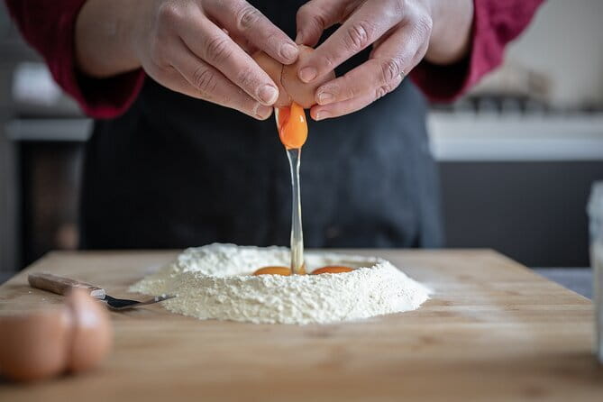 Florence: Pasta & Tiramisu Cooking Class with Unlimited Wine - Sitting down to eat what you prepared