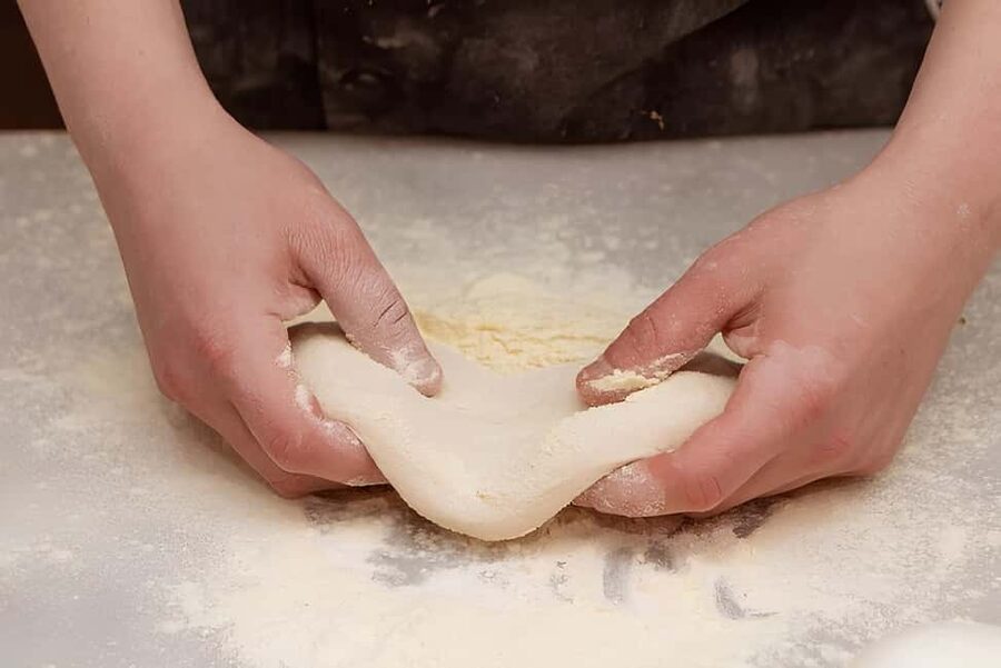 Florence: Private Pizza Making Class with Wine Tasting - Mixing and shaping the pizza dough