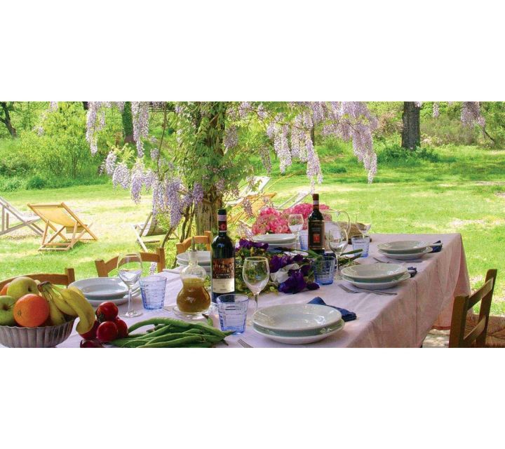From Florence: Outdoor Wine Dining in San Gimignano Winery - A short walk through the historic winery property