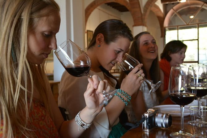 Half-Day Chianti Tour to 2 Wineries with Wine Tastings and Meal - First tasting: learning the basics with wine and olive oil