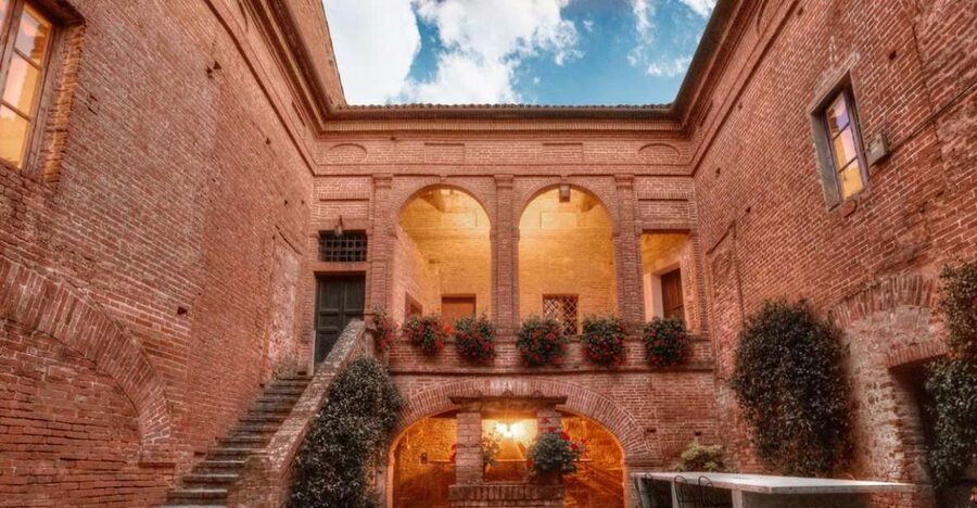 Montalcino: Brunello Wine Tasting & Lunch in a Tuscan Castle - Walking through the castle and vineyard