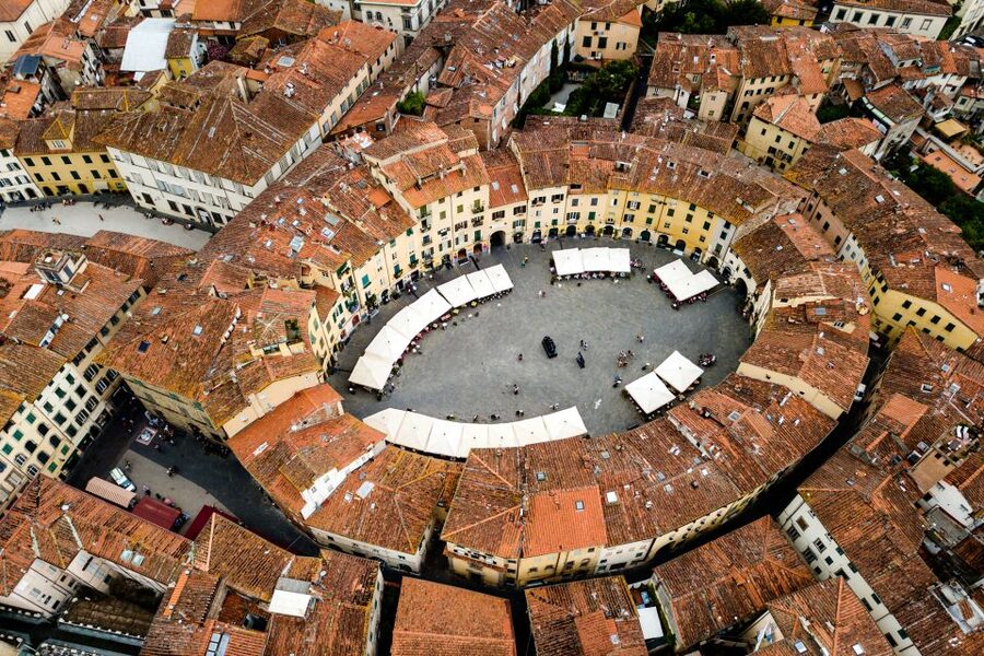 Pisa and Lucca: Private Full-Day Tour by Deluxe Van - Amphitheater Square and Lucca’s Roman Footprint