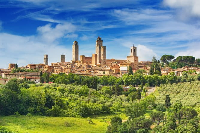 Private Tuscany Tour from Florence Including Siena, San Gimignano and Chianti Wine Region - San Gimignano: towers, stone lanes, and a short clock