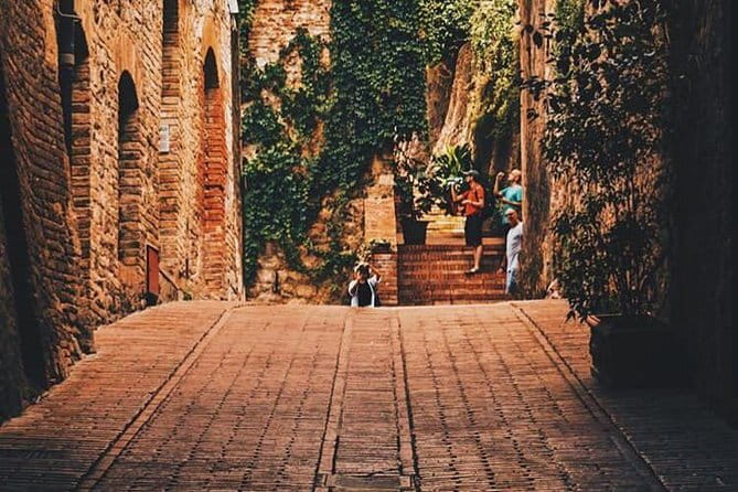 San Gimignano and Volterra Tour by Private Luxury Van - San Gimignano’s towers and sunny piazzas