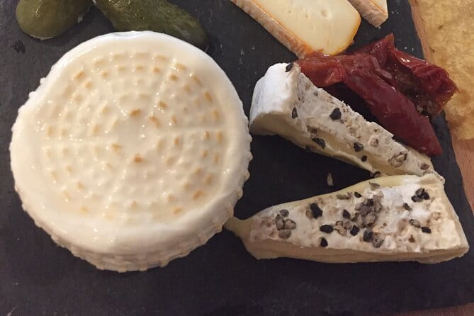 Semi Private tasting and Cheese-making Class in Florence - Cooking curds at Via Romana 41r Rosso
