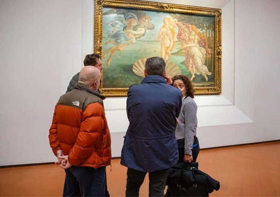 Semi Private Uffizi Gallery Guided Tour in Florence - Climbing the grand staircase with a guide