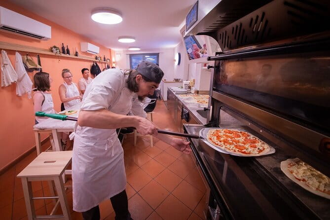Tuscan Cooking Class in an Art Gallery in Florence - Food, wine, and conversation at the table